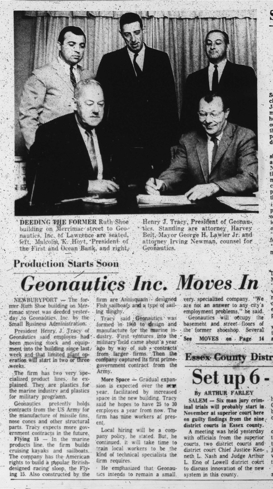 Geonautics Inc. Moves In — Henry J. Tracy at the deed signing