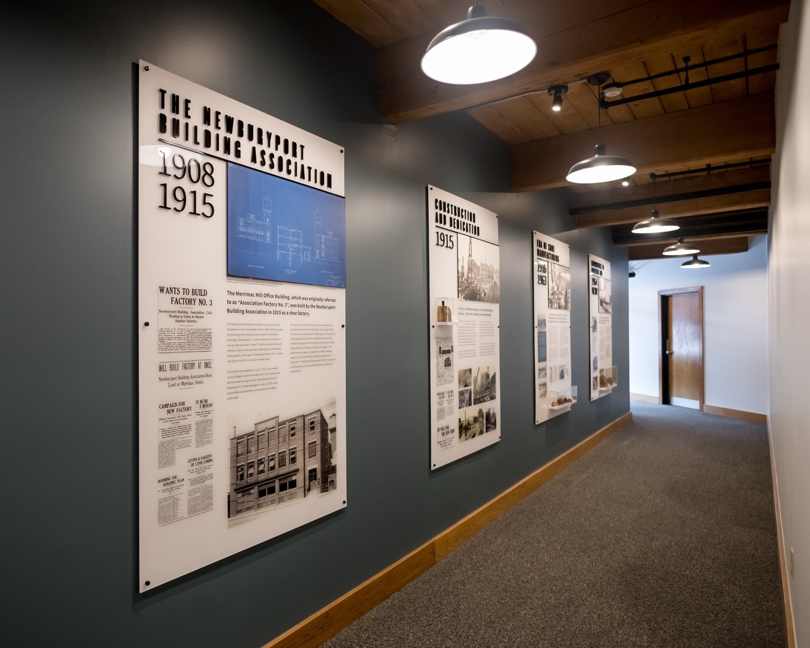 The lobby timeline wall — panels from 1908 through 1915