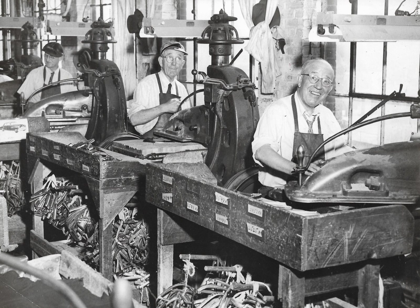 Cutters at their presses during the Ruth Shoe years