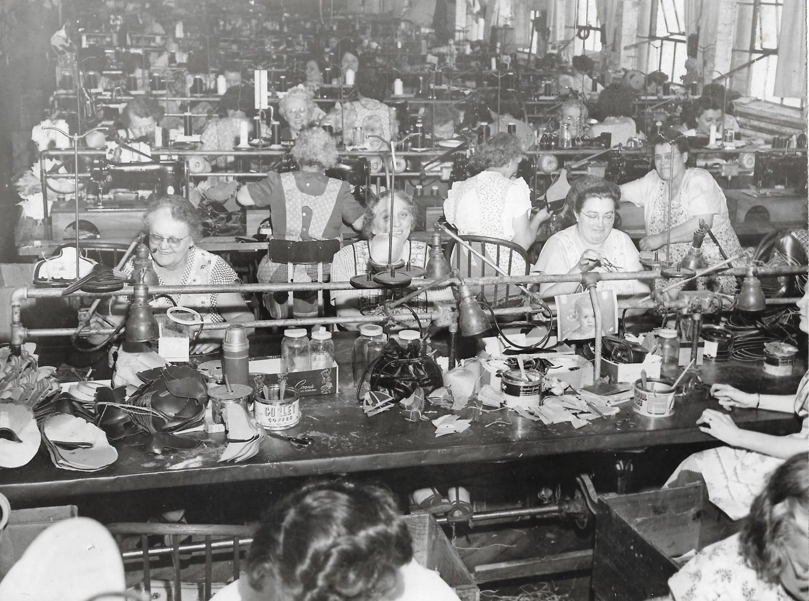 The stitching room at Ruth Shoe — rows of workers at Singer machines