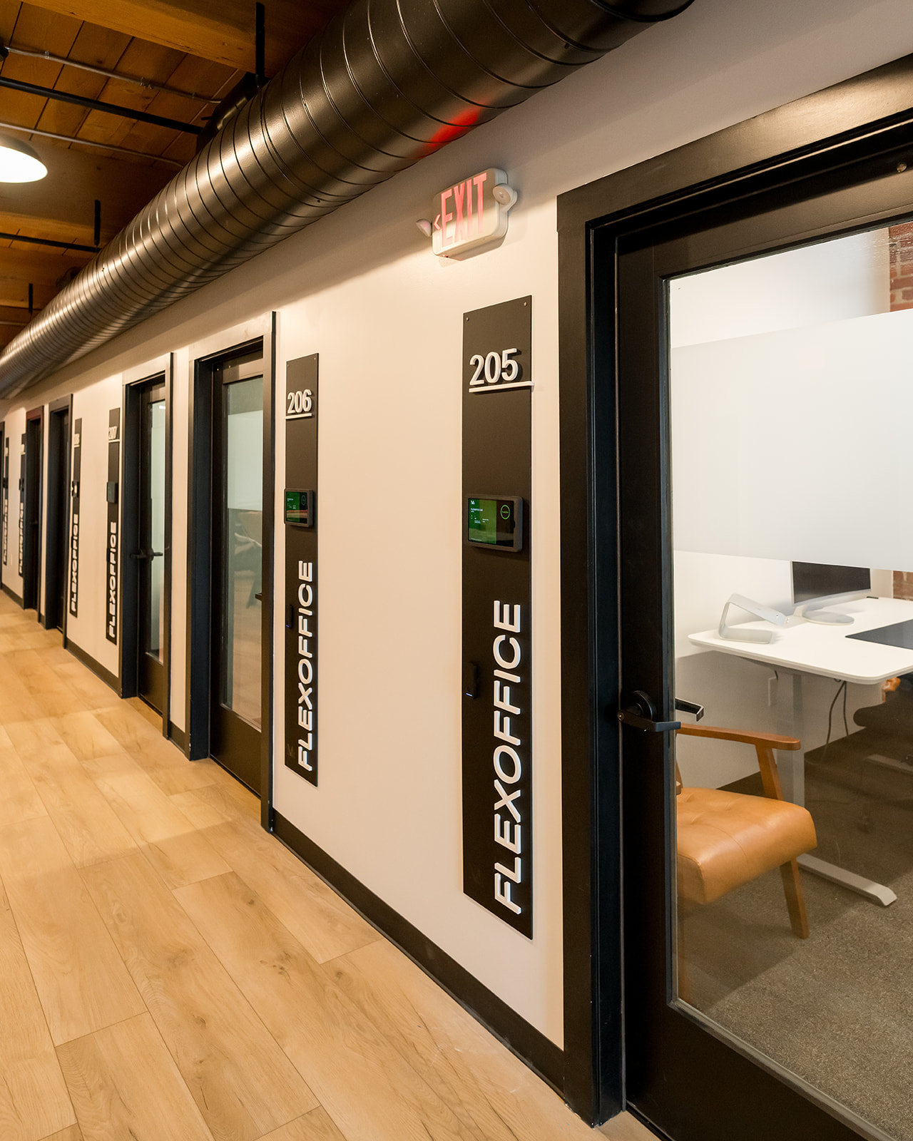 FlexOffice hallway with numbered doors and access panels